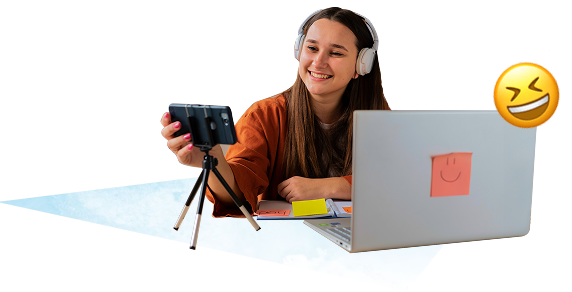 young woman taking a selfie while using a laptop